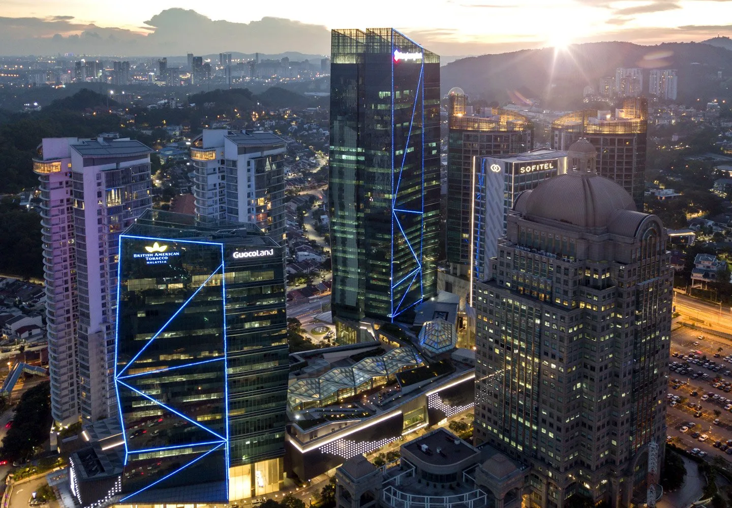 Damansara City developer image showing DC Residensi towers at dusk