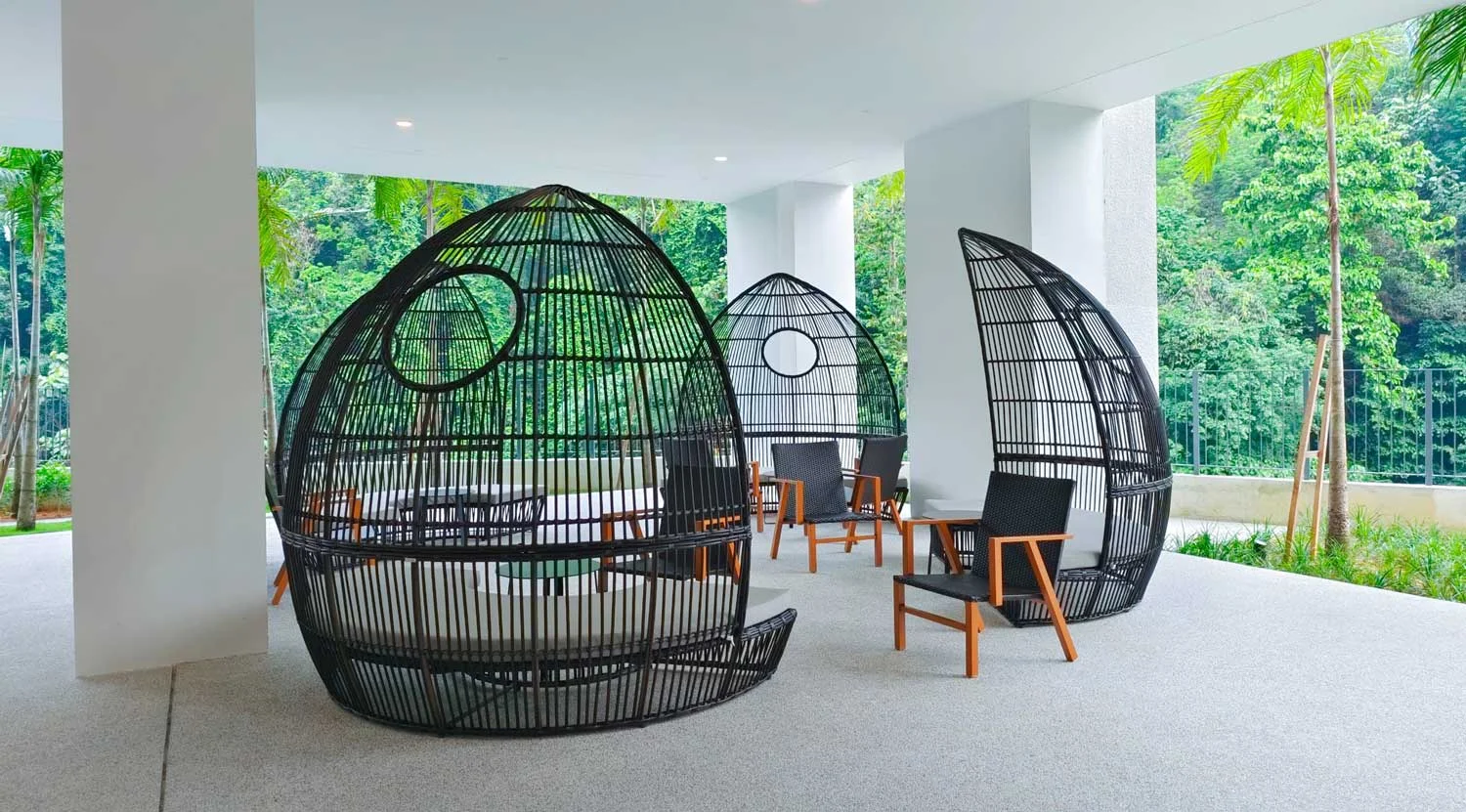 Sheltered seating beside landscaped greenery at Hampton Damansara; project image